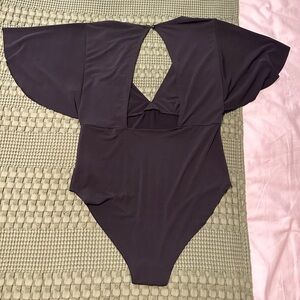 Black plunge neck bodysuit